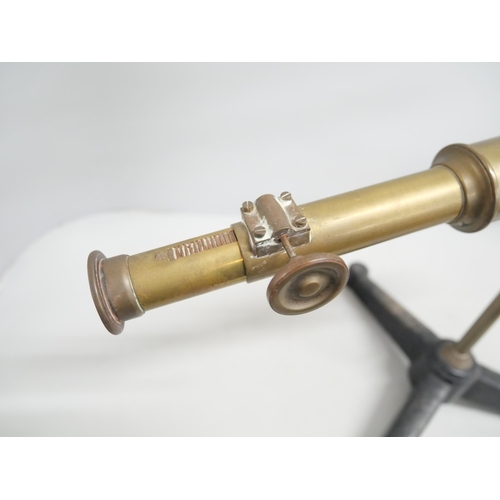 2216 - An early 20th Century Griffin and Tatlock brass rack and pinion desk telescope on tripod base stand