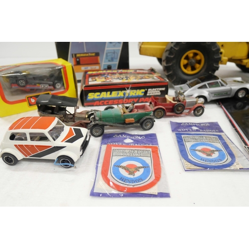 2221 - A collection of Scalextric and Tonka model digger