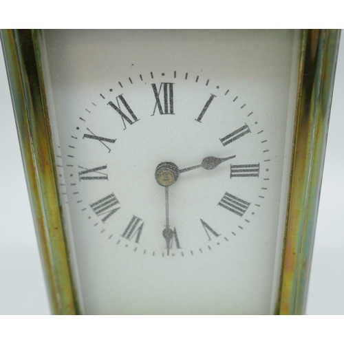 2239 - A small brass four glass sided carriage clock, 11cm tall