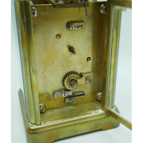 2239 - A small brass four glass sided carriage clock, 11cm tall