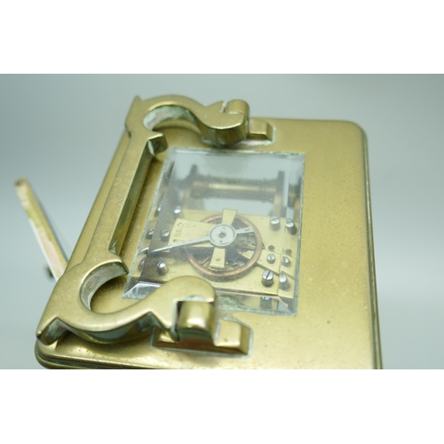 2239 - A small brass four glass sided carriage clock, 11cm tall