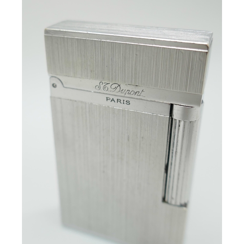 2247 - A St. Dupont Paris France lighter, brushed metal finish *This lot is not available for packing and p... 