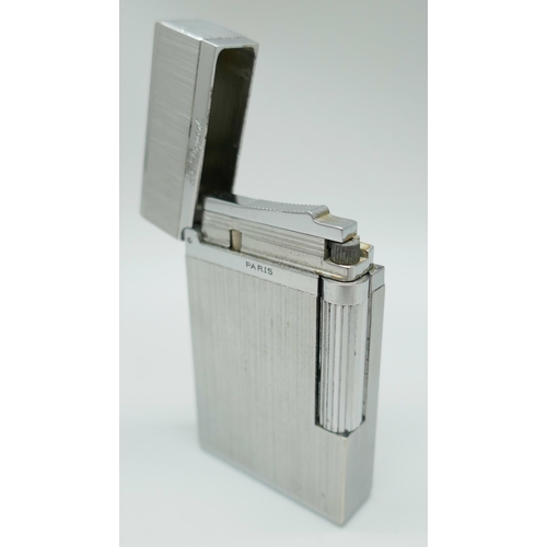 2247 - A St. Dupont Paris France lighter, brushed metal finish *This lot is not available for packing and p... 