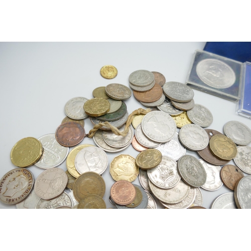 2251 - A collection of coins including British and foreign, including Cap Gemini commemorative Euro coin an... 