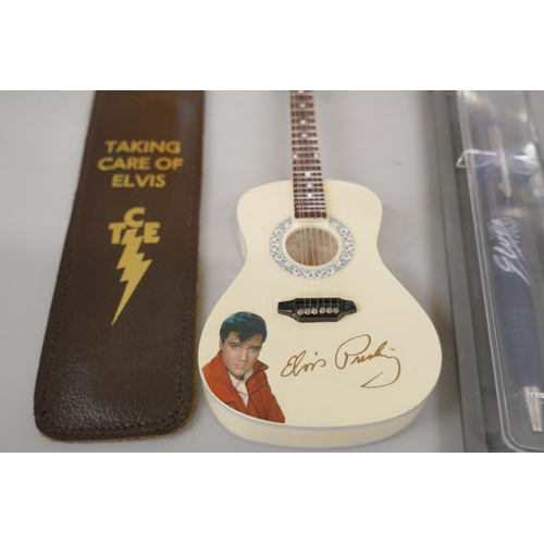 2261 - Elvis Presley memorabilia, two Limited Edition watches and guitars, Parker pen, key rings, comb, etc... 