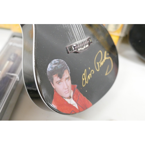 2261 - Elvis Presley memorabilia, two Limited Edition watches and guitars, Parker pen, key rings, comb, etc... 