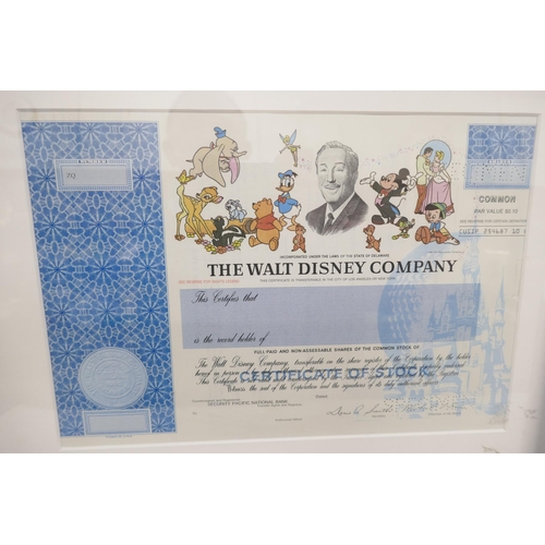 2277 - A collection of ten 50p Beatrix Potter coins together with framed Walt Disney certificate of stock