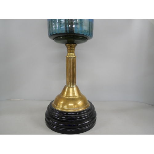 2291 - A brass oil lamp with blue glass reservoir **PLEASE NOTE THIS LOT IS NOT ELIGIBLE FOR IN-HOUSE POSTI... 