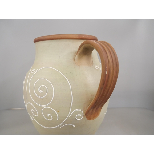 2295 - A sage green large ceramic jug with white piped decoration, marked M or W to base, Denby, 30.5cm