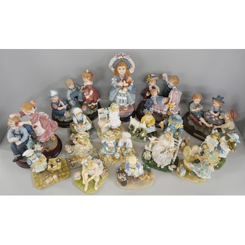 2300 - A collection of seventeen Juliana collection figures including five larger examples on wooden bases,... 