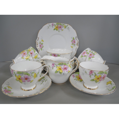 2320 - A Royal Grafton bone china part tea set and a Collingwoods bone china six setting tea set, lacking o... 