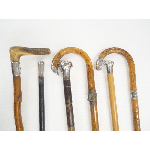 2324 - Six walking sticks/canes with silver embellishments, one with collar loose and a/f