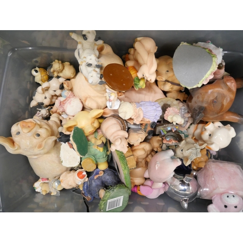 2330 - A box of model pigs including money banks, pottery, resin and metal, approximately 25 and a Pig Idol... 