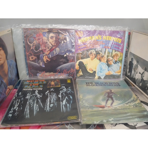 2331 - A collection of 30 rock and pop LP records and 12