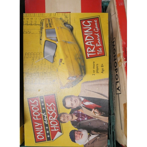 2377 - A large collection of vintage board games including three Monopoly, Only Fools and Horses, Tongue Ta... 