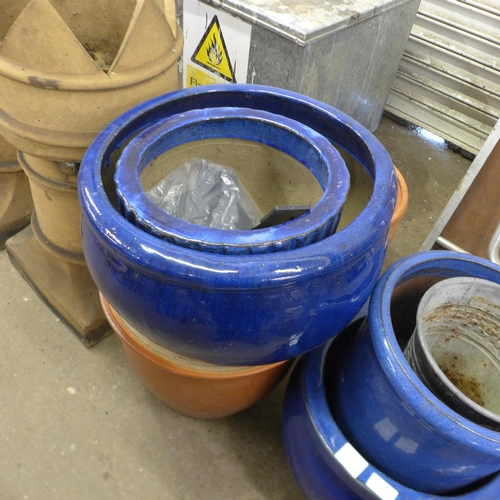 5159 - A collection of various terracotta/blue plant pots