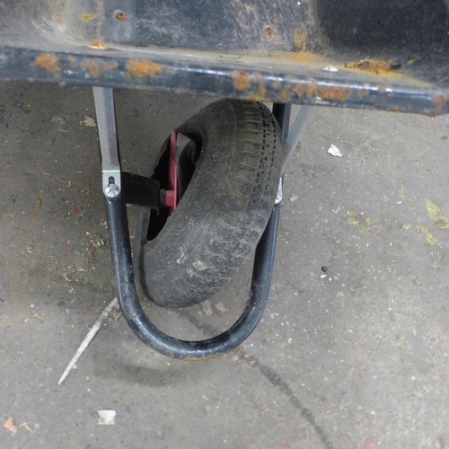 5205 - Two heavy duty metal wheelbarrows with a replacement wheel