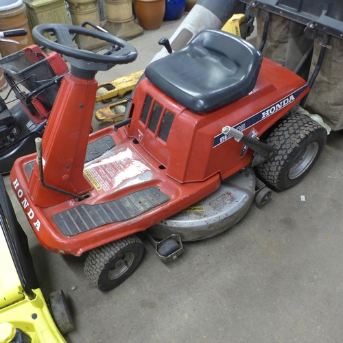 5209 - A Honda HTR3009 ride on mower - no battery, with key