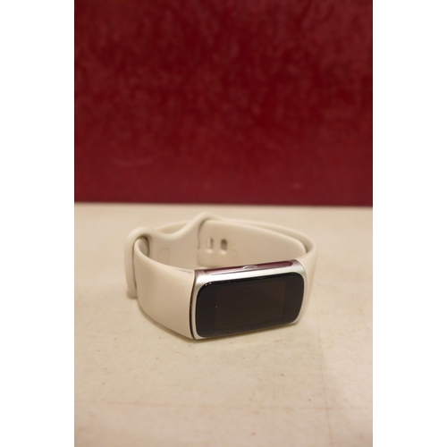 6247 - Fitbit Charge 6 activity tracker with beige wristband *This lot is subject to VAT