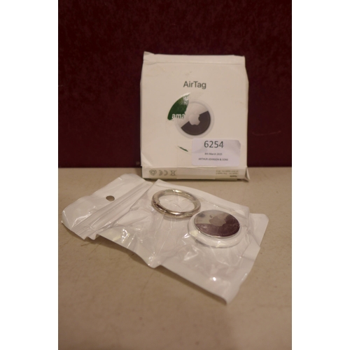 6254 - Apple AirTag tracking device *This lot is subject to VAT