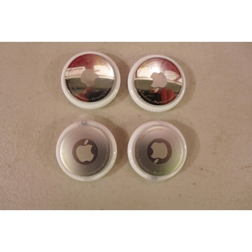 6264 - Four Apple AirTag tracking devices *This lot is subject to VAT
