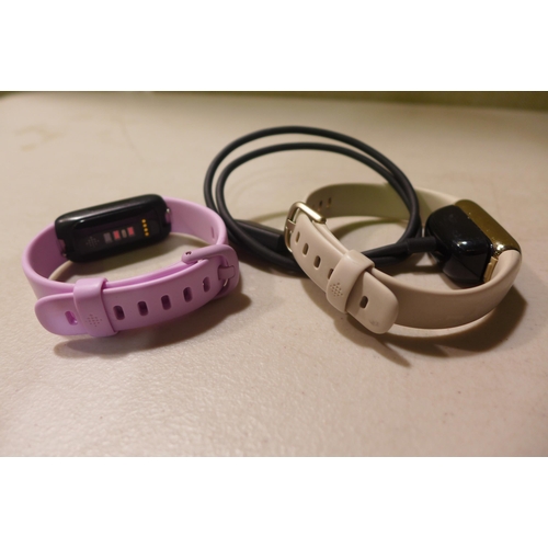 6281 - Fitbit Inspire 3 and a Fitbit Luxe fitness tracker *This lot is subject to VAT