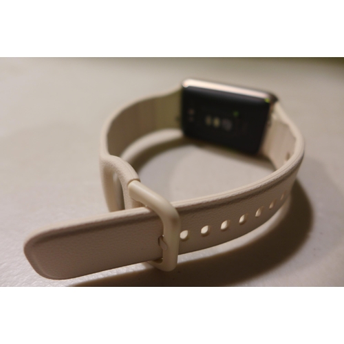 6296 - Oppo Watch Free smart watch with cream wrist band, model no: OWWE201 *This lot is subject to VAT