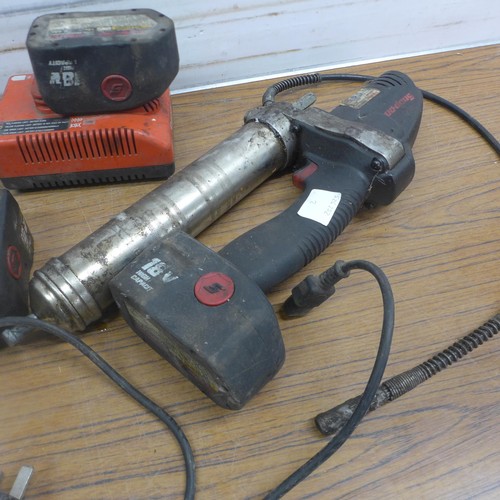 5063 - A Snap-On grease gun with 5 batteries and charger, 18v