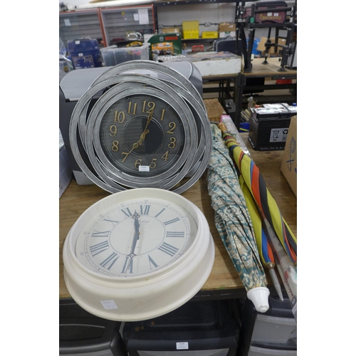5218 - A quantity of household items including 2 clocks, a roller blind and 3 parasols