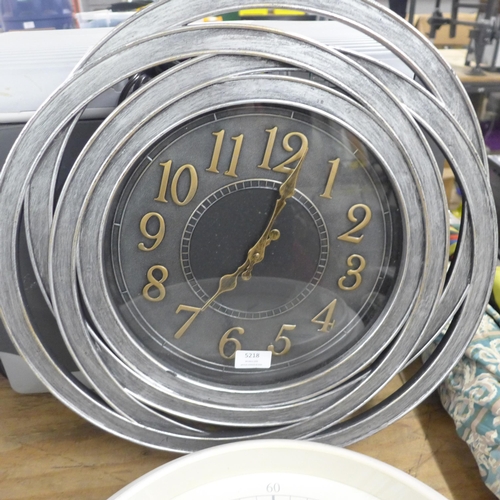 5218 - A quantity of household items including 2 clocks, a roller blind and 3 parasols