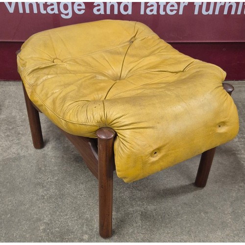 26 - A Guy Rogers teak and mustard leather Santa Fe footstool