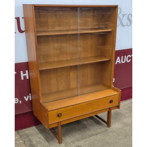 15 - A Turnidge of London teak bookcase