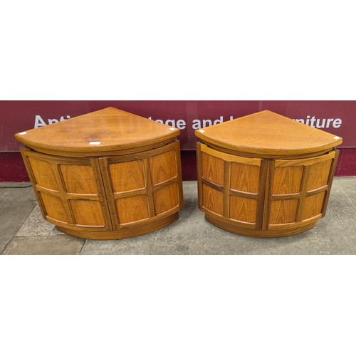 12 - A pair of small Nathan Squares teak corner cabinets