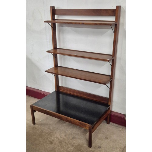 20 - A Guy Rogers teak and black laminate four tier room divider, retailed by Heals of London