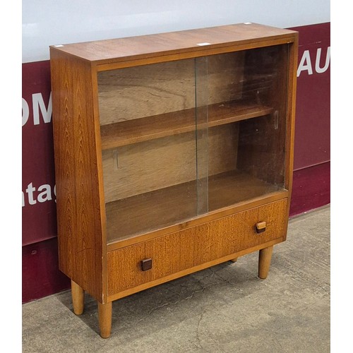 29 - A teak bookcase