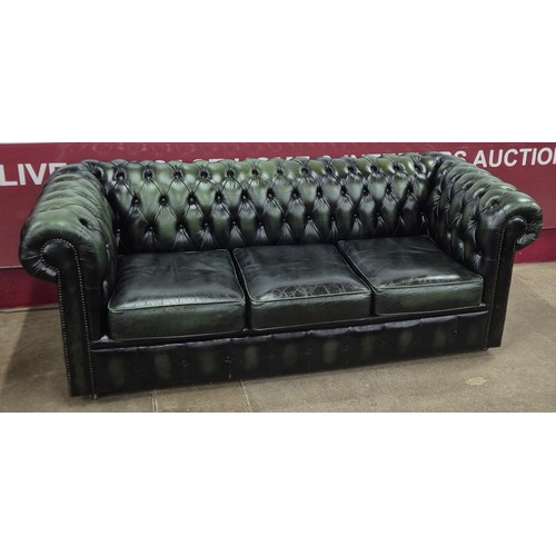 3 - A green leather Chesterfield settee