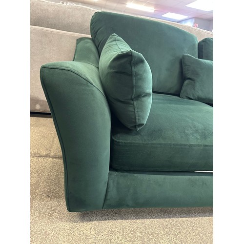 3310 - A green velvet corner chaise sofa