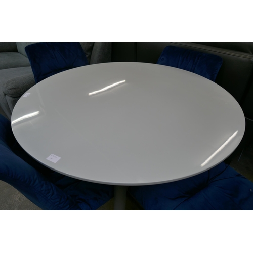 3111 - A grey gloss circular dining table and four navy velvet upholstered dining chairs