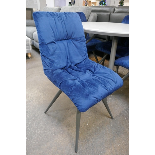 3111 - A grey gloss circular dining table and four navy velvet upholstered dining chairs
