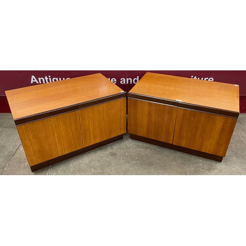 54 - A pair of G-Plan teak two door cupboards