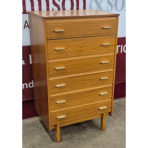 48 - A teak chest of drawers