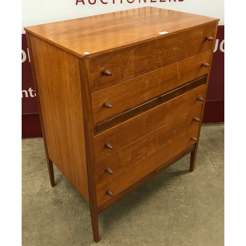 69 - A teak chest of drawers