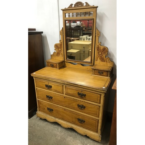 168 - A Victorian scumbled pine dressing chest