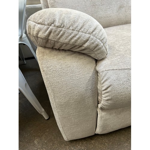 3204 - A cream pile velvet upholstered two seater sofa