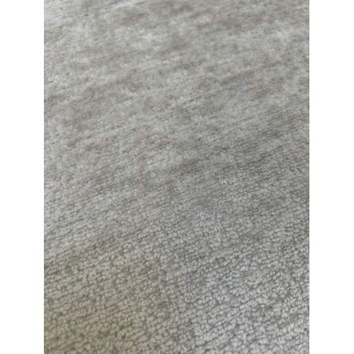 3204 - A cream pile velvet upholstered two seater sofa