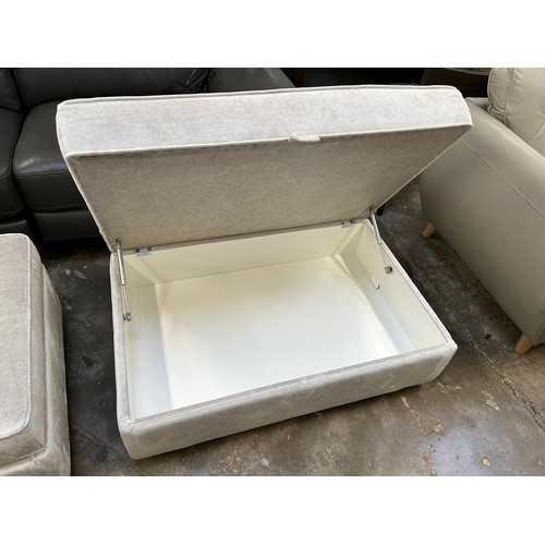 3205 - A large magnesium pile velvet storage footstool (damaged)