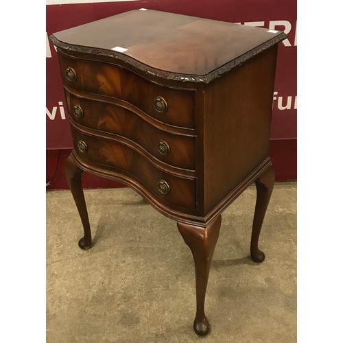 155 - A Regency style mahogany serpentine chest of drawers