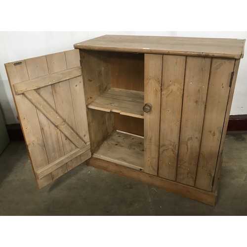 159 - A Victorian pine two door pantry cupboard