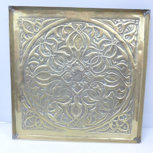 2004 - A large square embossed brass plaque, 36cm