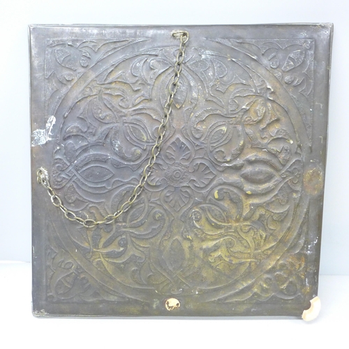 2004 - A large square embossed brass plaque, 36cm